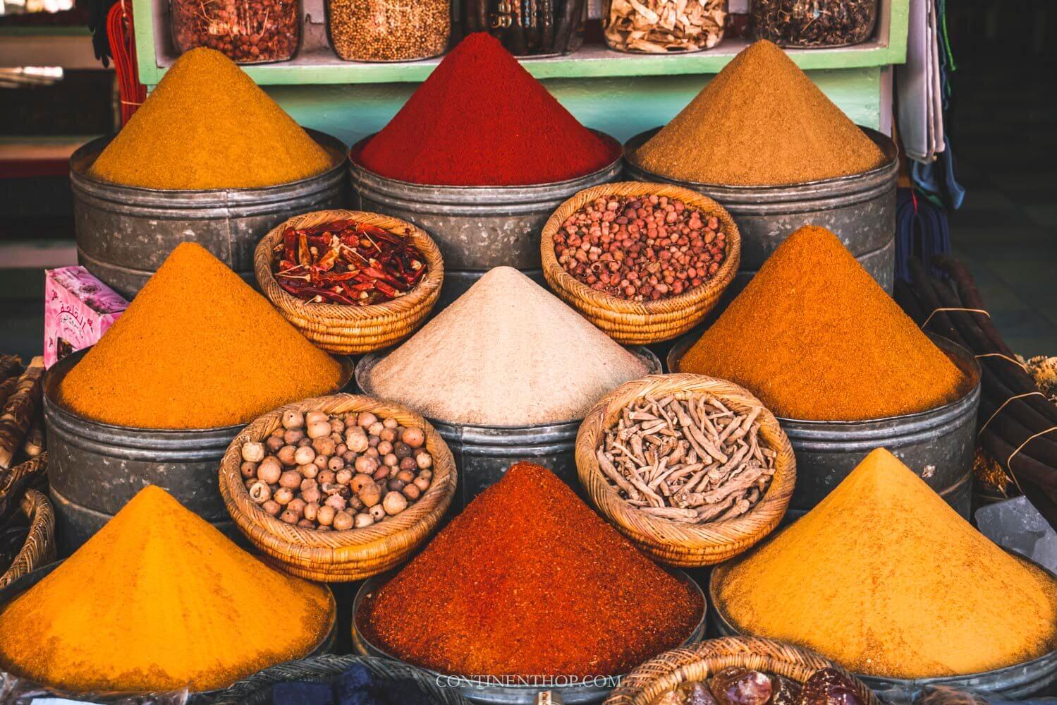 Colorful spices and lanterns in a Marrakech souk